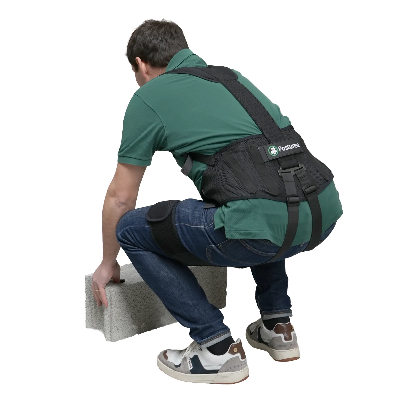 Professionnel accroupi portant un bloc avec l’exosquelette Dominique